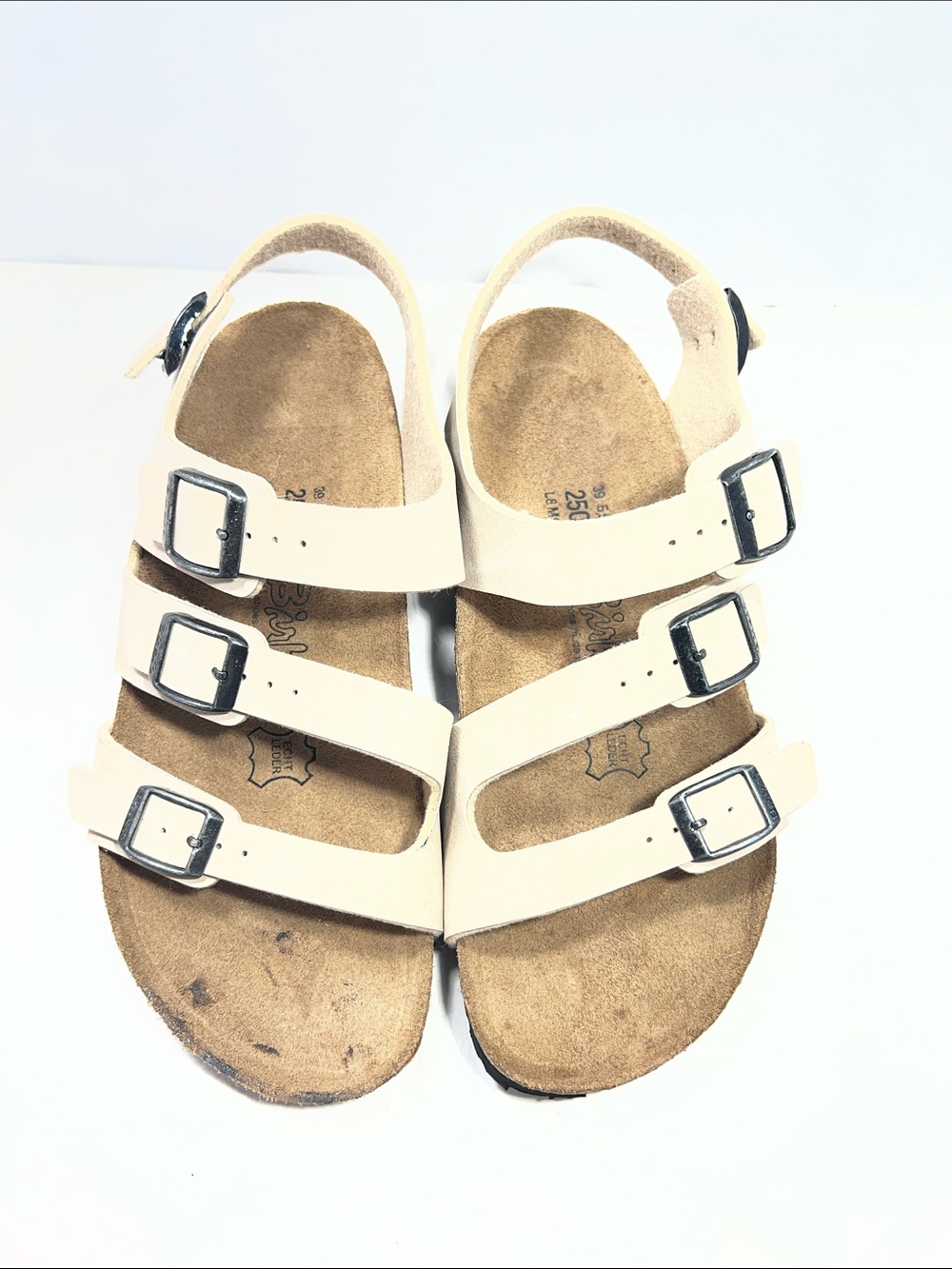 Birkenstock women Triple-Strap Buckle Sandals in Cream